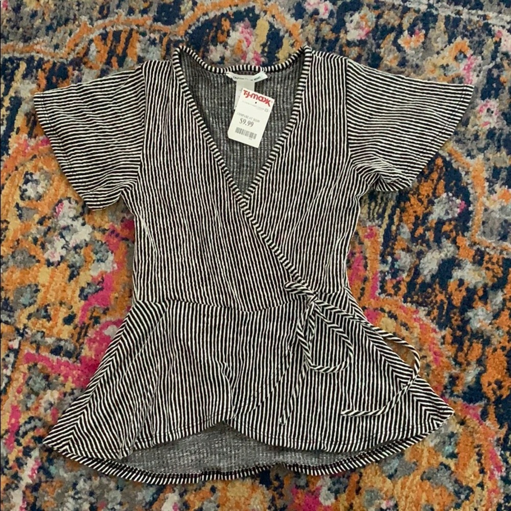 Caution to the wind wrap top